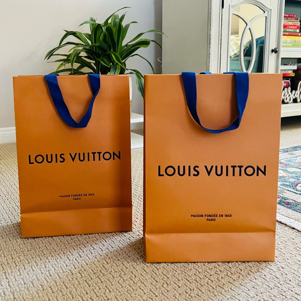 Louis Vuitton 2x paper bags.